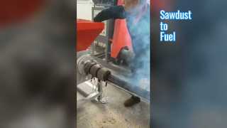 macchina della mattonella della segatura