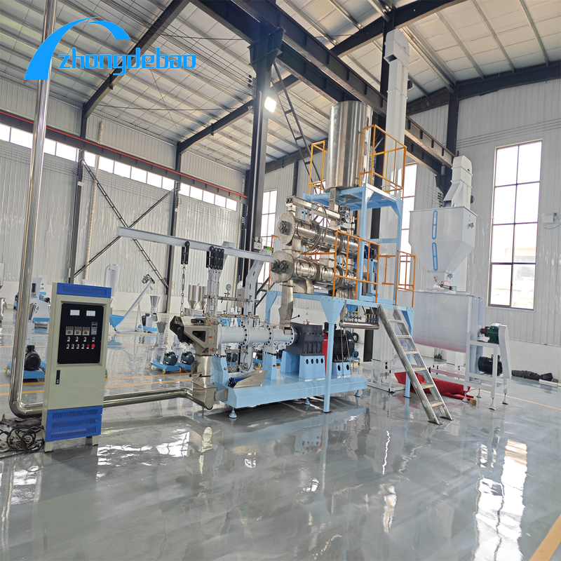 Linea di produzione di mangime per pesci galleggiante con estrusore utilizzando materie prime di mais che producono bricchette a forma di cuscino o di pane per l'acquacoltura